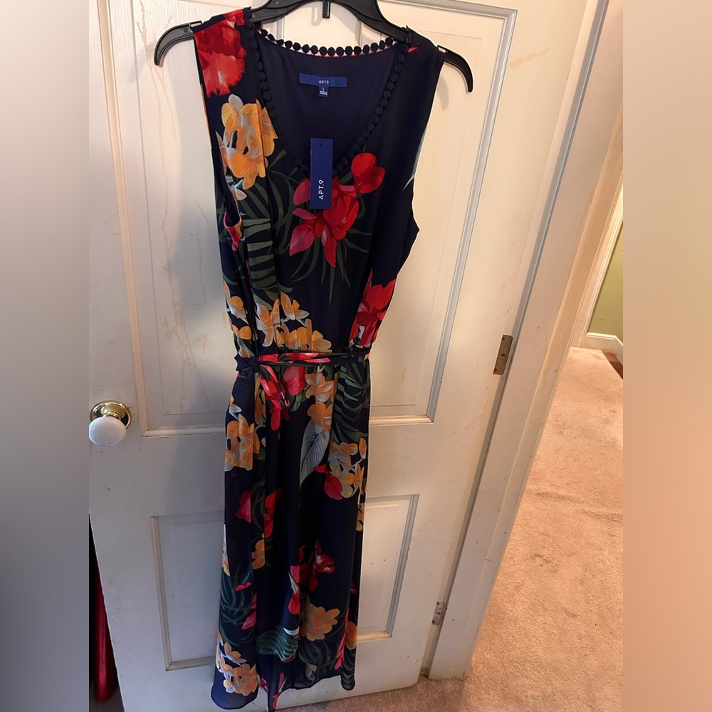 Beautiful hi-low Apt. 9 dress in Navy blue, with flower accents, trim and belt!